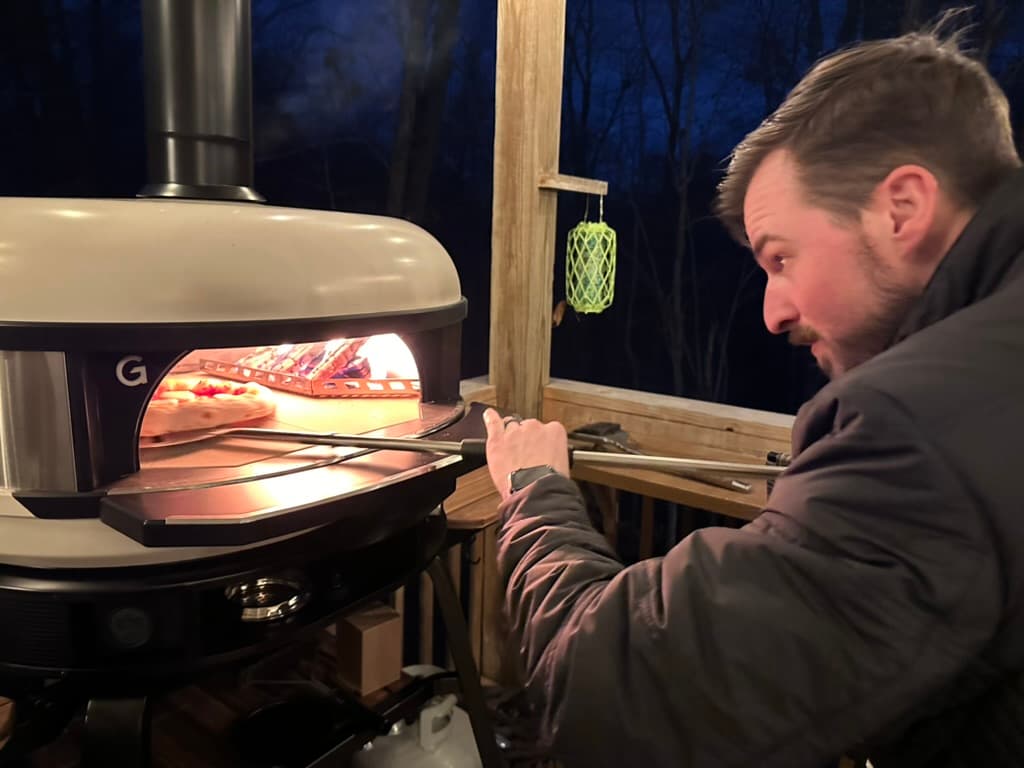 Steven making a pizza in a Gozney Dome